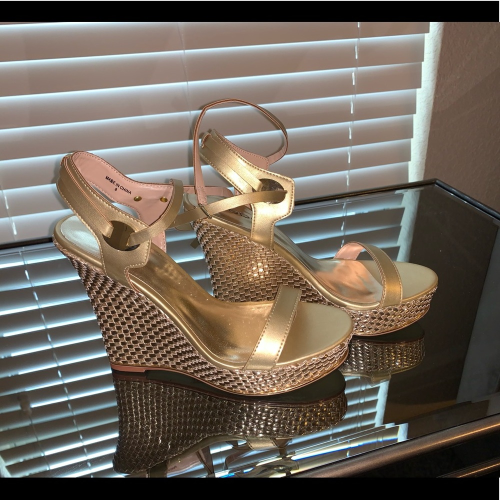 BEBE Women’s Strappy Wedge Heel